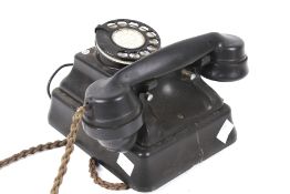 A vintage ATM bakelite telephone.