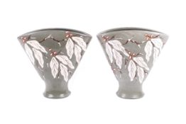 A pair of C H Brannam Ltd Royal Barum Ware vases.