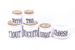 Six T. G. Green ceramic kitchen canisters.