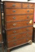 A Victorian mahogany chest on chest. Two short over six long drawers, raised on bracket feet.