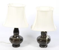A pair of mid-century ceramic Chinese style table lamps.