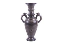 An early 20th century large Japanese inlaid bronze urn.