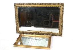 Two contemporary gilt wall mirrors.