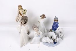 Seven porcelain figures.