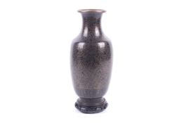 A 20th century Chinese black cloisonne vase.