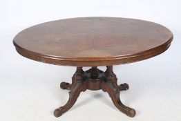 A Victorian tilt top oval table.