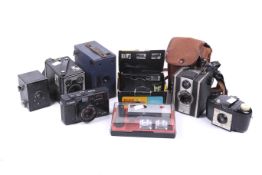 A collection of vintage cameras.