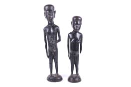 Two large Solomon Islands carved wood figures.