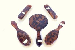 A vintage faux tortoise shell dressing table set.