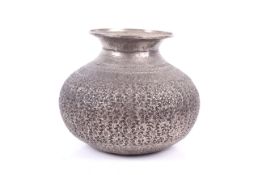 An Indian silver-plated copper vase or urn.
