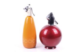 Two vintage metal soda syphons.