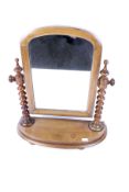 An Edwardian mahogany dressing swing table mirror.