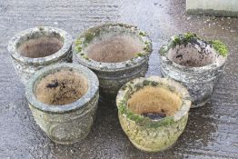 five circular garden pots.
