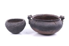 Papua New Guinea. Two blackened earthenware cooking bowls.