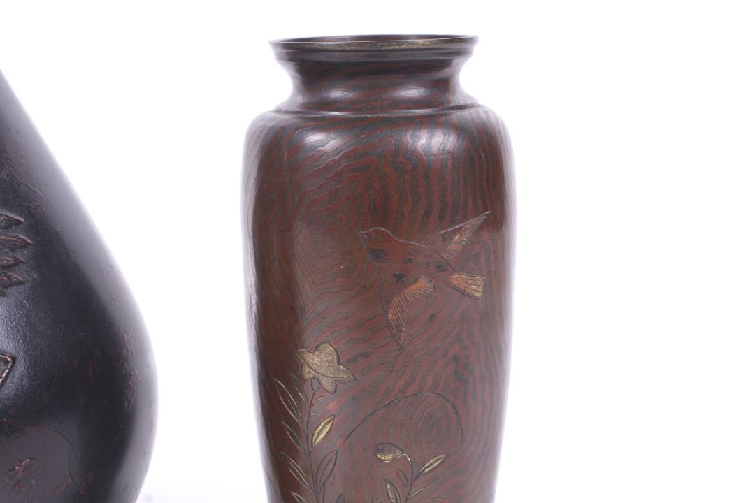 A pair of small bronze Japanese Meiji period vases and a further vase with cranes. - Image 2 of 3