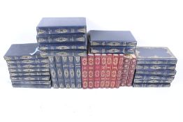 A large collection of leather bound Heron classical volumes.