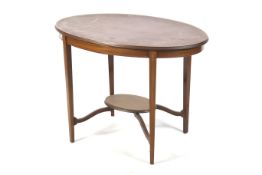 A mahogany oval table.