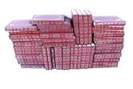 A set of Dennis Wheatley volumes.