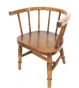 A Victorian oak child's windsor chair.