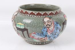 A 20th century Japanese crackle glaze planter. With seated figures decoration.