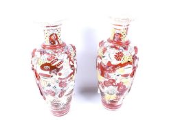 A pair of 20th Century Japanese Satsuma pottery vases.
