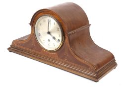 An Edwardian mantel clock.