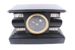 A Victorian slate and marble mantel clock.