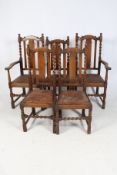A set of five 20th century oak framed chairs.