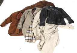 A selection of gentlemans suits jackets and coats.