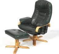 A Stressless style green leather chair and footstool.