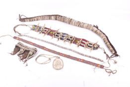 Papua New Guinea. A group of bead, bone and shell adornments.