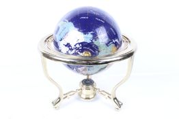 A table top gemstone world globe.