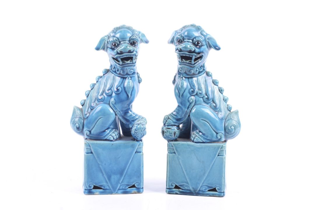 A pair of Chinese turquoise glazed fo dogs. - Image 1 of 2
