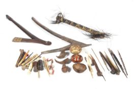 Papua New Guinea. Two carved axe handles, carved scepters and other accessories.