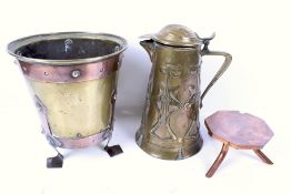 Three assorted Arts and Crafts style metalware items.