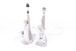 Two Zaphir porcelain lamp bases. Modelled as children beneath trees. Max.