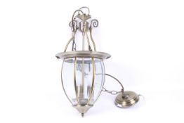 A contemporary brass hall lantern light fitting.