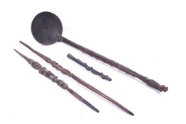 Papua New Guinea. A large carved ladle, two 'scepters' and a handle.