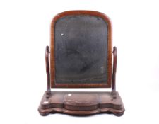 A 20th century mahogany veneered dressing table mirror.