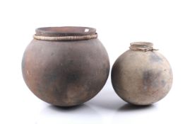 Papua New Guinea. Two rounded earthenware pots.