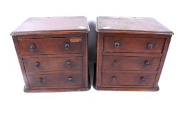 A pair of miniature mahogany chests of drawers. Originally dressing table elements.
