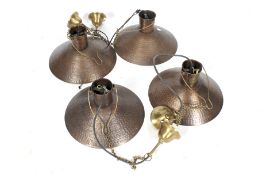 A set of four Ancienne copper ceiling lights.