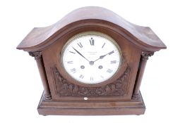 A J. W. Benson Ltd mahogany cased mantel clock. Having a Medaille D'Argent 1855 mechanism no.