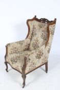 A 20th century mahogany armchair.