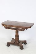 A Victorian mahogany tea table.