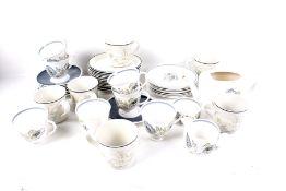 A Susie Cooper 'Glen Mist' tea service and six Royal Doulton 'Hampstead' trios.