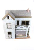A contemporary dolls house shop. The shop is from the 