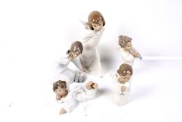 Five Lladro Daisa cherubs. In a variety of poses including one playing an instrument.