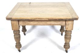 A Victorian oak scrub top draw leaf dining table.