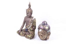 Two contemporary models of Buddhas.